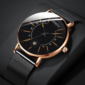 Close-up of rose gold watch dial with date display and black mesh stainless steel strap