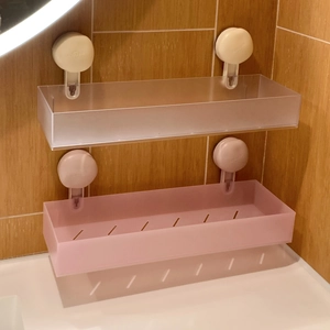 Macro detail of suction cup wall storage rack with drainage holes for bathroom and kitchen