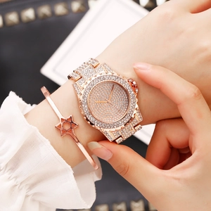 Luxurious rose gold watch and star bracelet set with full crystal pavé on metal strap