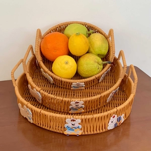 Three-piece nesting woven storage baskets with dual handles and cartoon animal accents