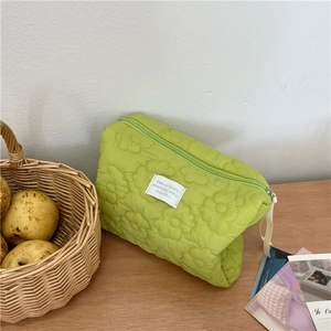 Quilted floral makeup bag in pastel green with soft fabric and large capacity