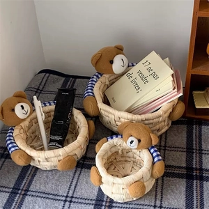 Three-piece bear-themed hand-woven straw storage baskets with cute blue plaid fabric details