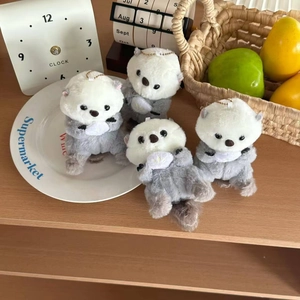 Set of 4 cute plush sea otter charms with gold chains for backpack and keychains