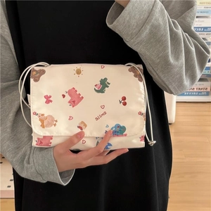 Cute cartoon bear printed white crossbody bag with adjustable strap and high-capacity storage