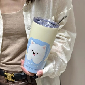 Cream stainless steel straw cup with cute puppy print and transparent lid held by model