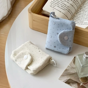 Mini star pattern coin purses in light blue and white with snap button and carry loop