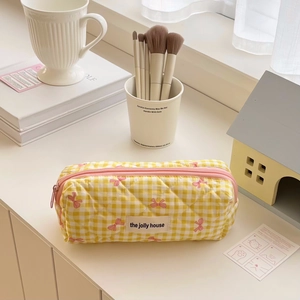 Cute yellow checkered quilted pencil case with floral bows and pink zipper closure