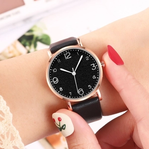 Minimalist women's leather watch with rose gold case and black frosted numeric dial
