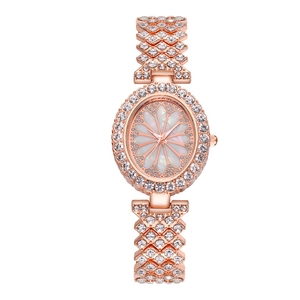 Montre à Quartz Élégante Pour Femmes Cadran Ovale Strass Alliage Bracelet À Maillons Ajourés Mode Luxe