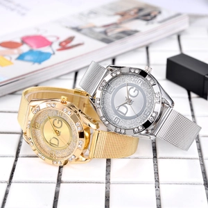 Elegant ladies' mesh watch with rhinestone bezel and shimmering glitter dial