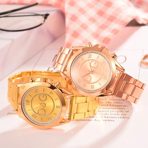 Luxurious pair of gold and rose gold quartz watches with metal link bracelets for couples