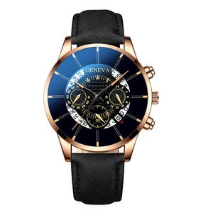 Detail of rose gold quartz watch featuring blue dial, date window, and black leather strap