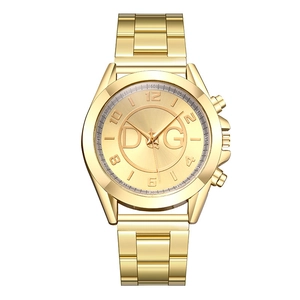 Close-up of gold stainless steel watch band with three-link structure and polished finish