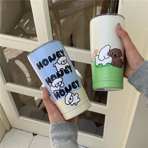 Detail of Korean style cartoon dog thermos cup with honey text and straw lid