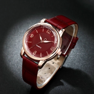 Elegant rose gold women's quartz watch with red leather strap and croc texture