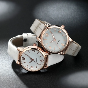 Minimalist women's quartz watch with rose gold case and white crocodile leather strap