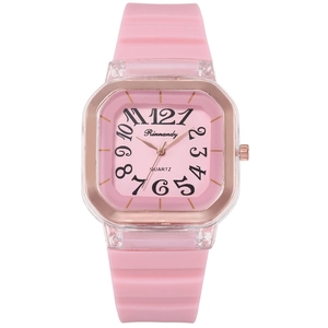 Detailed view of square pink silicone watch with rose gold inner bezel and digital dial