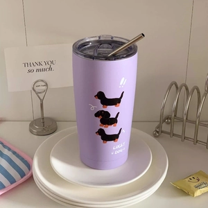 Detail of lavender stainless steel straw cup featuring cute dachshund puppy illustrations