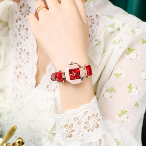 Women's octagon rose gold watch with red leather strap and rhinestone dial markers