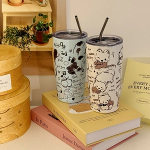 Detail of insulated cartoon puppy mugs with stainless steel straws and clear lids