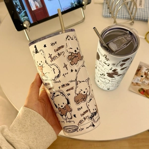 Detailed view of white cartoon dog stainless steel tumbler with straw and clear lid