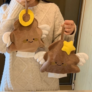 Detail of creative plush poop-shaped tissue holders with soft wings and star accents