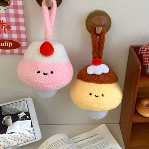Macro detail of cartoon plush dessert night lights hanging on a wooden wall hook