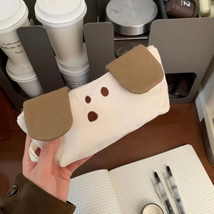 Detail of cute puppy canvas pencil case with 3D ears and minimalist embroidery