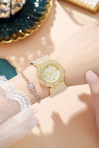 Luxurious gold-tone quartz watch with rhinestone detailing and heart crystal bracelet set