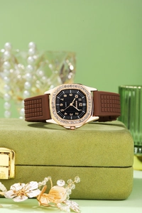 Detailed macro view of a luxury square quartz watch featuring a crystal-set bezel and black dial