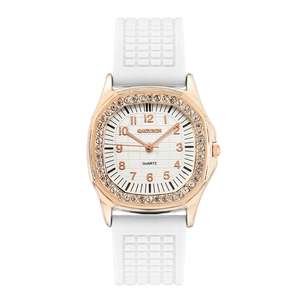 Detailed view of rose gold bezel set with white crystals and white silicone strap