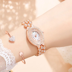 Set elegante orologio da donna in oro rosa con strass e bracciale a cuore
