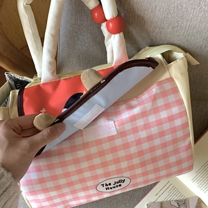 Pink checkered insulated lunch bag with dachshund motif and thermal foil lining