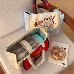 Detail of insulated puppy lunch bag showing the aluminum foil lining and spacious interior