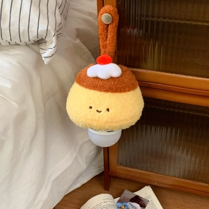 Hanging cartoon plush dog night light with soft yellow fur and cherry detail on cabinet