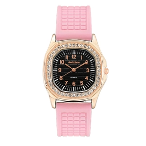 Macro shot of Gadyson quartz watch featuring a pink silicone strap and crystal bezel