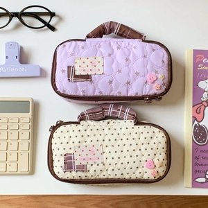 Quilted fabric stationery bags with heart pattern and top handles in lilac and cream