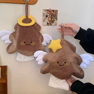Close-up of brown plush cloud tissue holders with yellow star and halo decorative details
