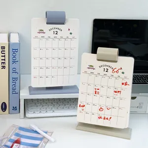 Vertical 2026 desk calendar set featuring minimalist hand-drawn illustrations and stand