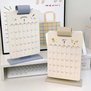 Close-up of 2026 vertical desktop flip calendar with English and Chinese date display