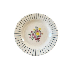 French retro ceramic bowl with hand-painted floral pattern and blue striped rim