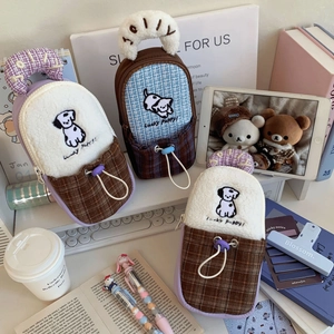 Detail of soft plush and tweed storage case for DJI Pocket 3 with cute puppy embroidery