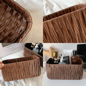 Detail of dark brown woven storage basket showing rectangle texture and corner design