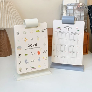 Vertical 2026 desk calendar with monthly planning pages in cream and light blue tones