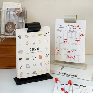 Macro shot of 2026 minimalist desk calendar with black base and creative inner monthly view