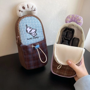 Detailed view of checkered DJI Pocket 3 storage case with puppy embroidery and plush handle