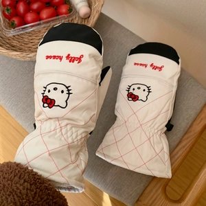 Detail of Hello Kitty cartoon embroidery on padded white waterproof ski mittens