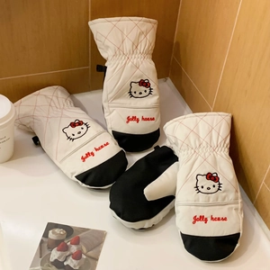 Detailed close-up of white waterproof cat mittens with warm red quilted stitching and embroidery