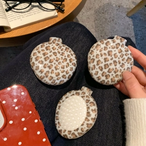 Portable leopard print folding hairbrush with integrated makeup mirror for travel