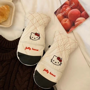 Detail of Hello Kitty quilted ski gloves with cozy thermal lining and secure clip